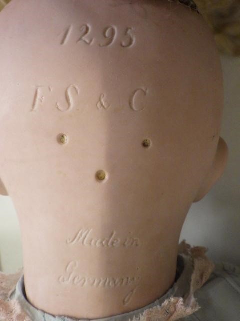 A Franz Schmidt & Co bisque socket head doll Image