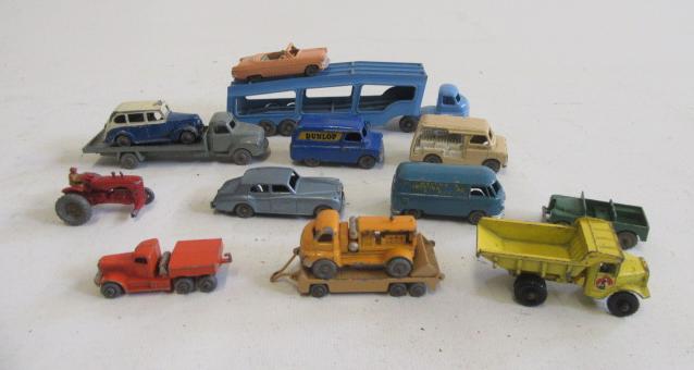 Nine Matchbox vehicles including car transporter Image