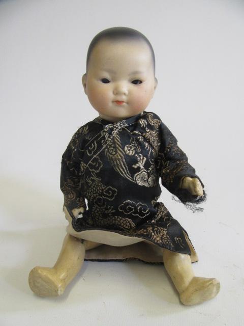 An Armand Marseille "ELLAR" bisque socket head oriental doll Image