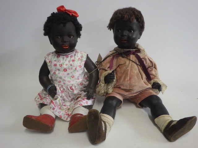 Two bisque socket head black baby dolls Image