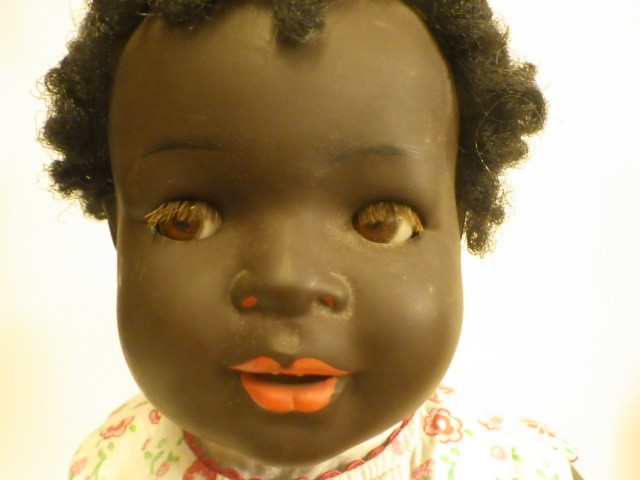 Two bisque socket head black baby dolls Image