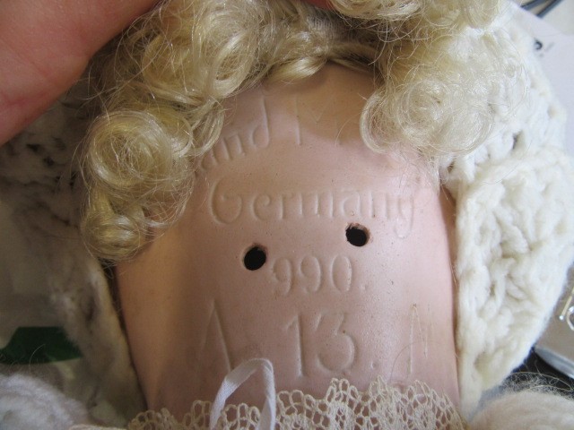 An Armand Marseille bisque socket head doll Image