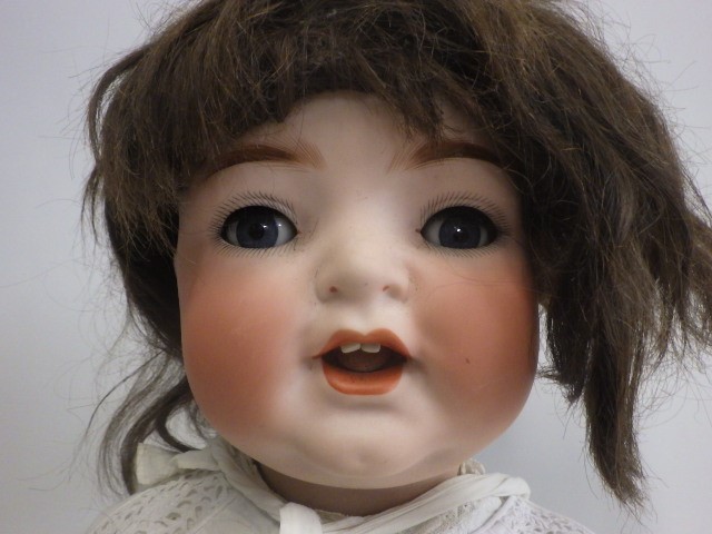 A Heubach Koppelsdorf bisque socket head character doll Image