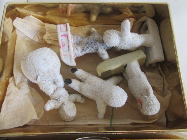 Five bisque snow babies Image