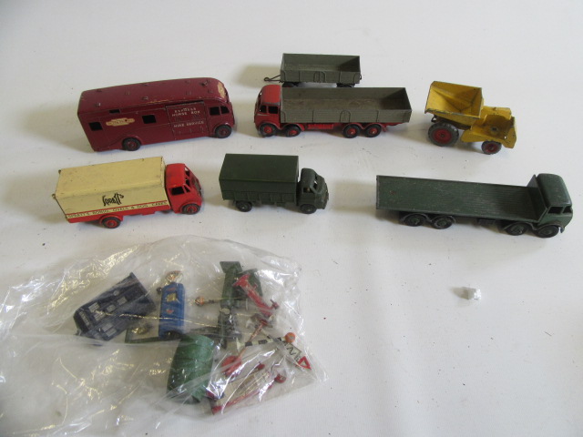 Seven playworn Dinky vehicles comprising Foden flat bed lorry Image