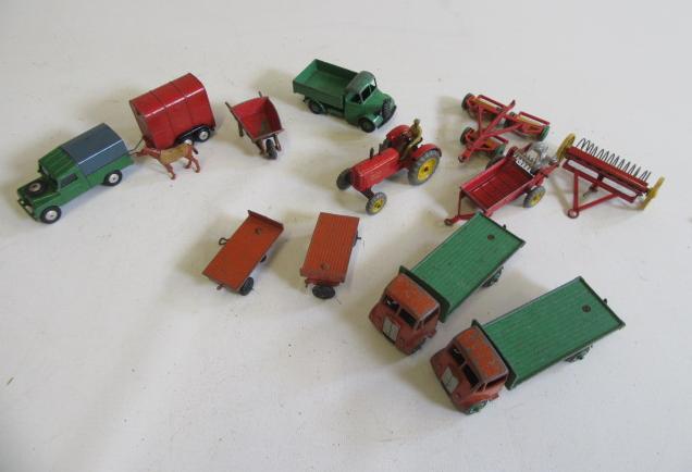 Playworn Dinky vehicles including farm tractor and equipment Image
