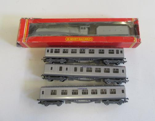 Hornby A4 Silver Link locomotive and three Hornby Silver Link coaches Image