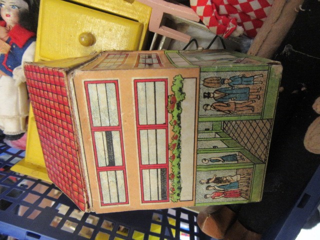 A collection of dolls and ephemera Image