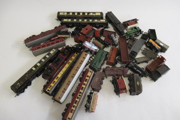 Playworn rolling stock by Hornby and others including Pullman coaches and goods trucks Image