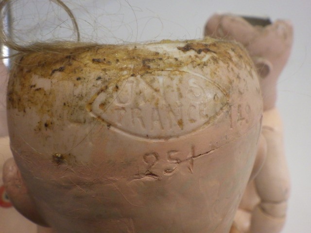 Three damaged bisque socket head dolls Image