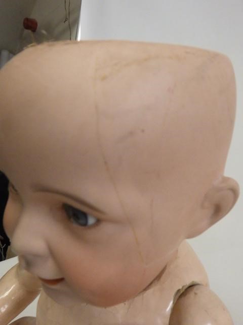 Three damaged bisque socket head dolls Image