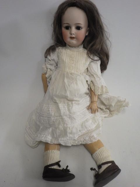 A Heubach Koppelsdorf bisque socket head doll Image