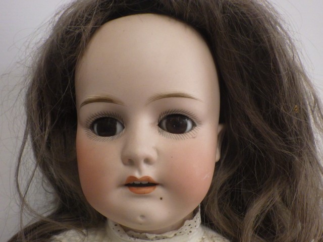 A Heubach Koppelsdorf bisque socket head doll Image
