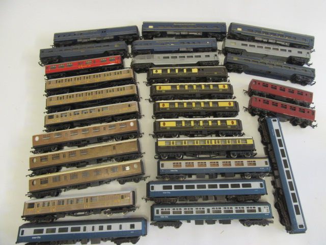 A large quantity of playworn coaches by Hornby including Pullman L.N.E.R. teak and Intercity Image
