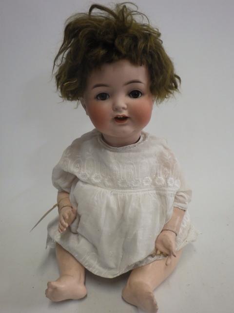 A Cuno & Otto Dressel bisque socket head doll Image