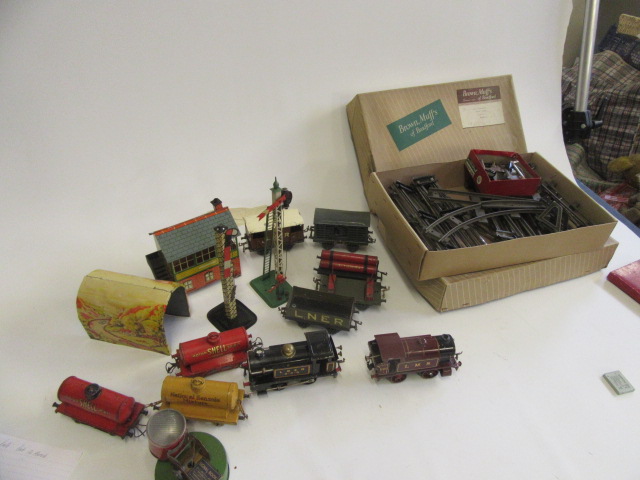 Playworn Hornby trains with clockwork 0-4-0 L.M.S. tank Image