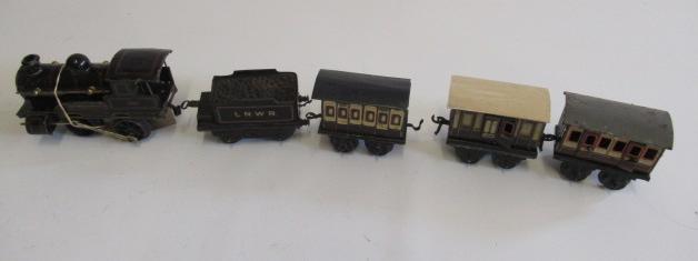Bing clockwork 0-4-0 George The Fifth locomotive and three L.N.W.R. coaches (Est. plus 21% premium Image