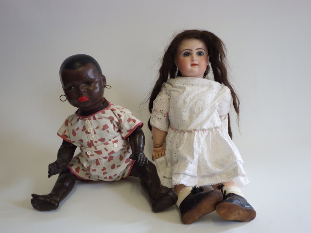 A restored French bisque socket head doll Image