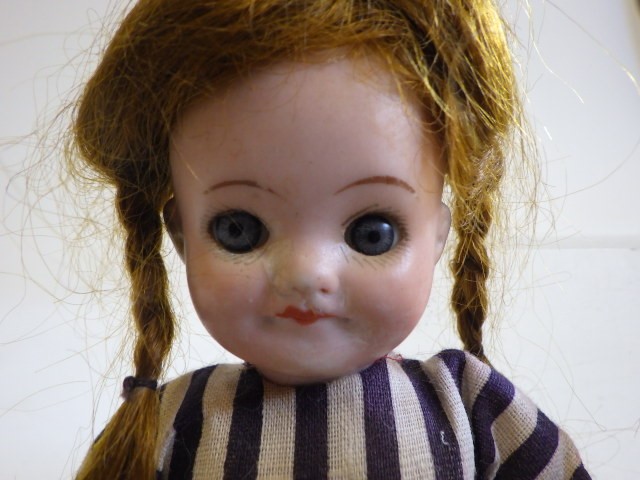 Two J. Walther & Sohn bisque socket head dolls Image