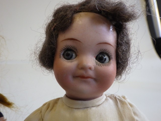 Two J. Walther & Sohn bisque socket head dolls Image