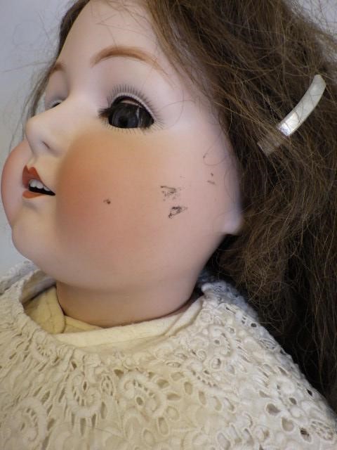 A large Heubach bisque socket head doll Image