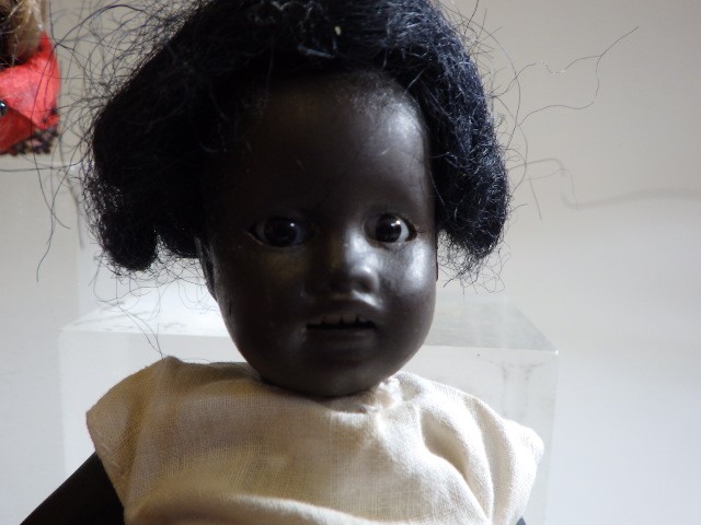 Four small bisque head dolls Image