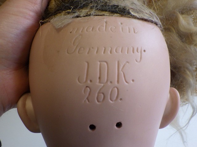 A J.D. Kestner bisque socket head character doll Image