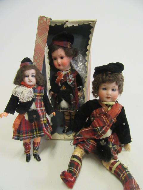 Three Scottish Armand Marseille bisque socket head dolls Image