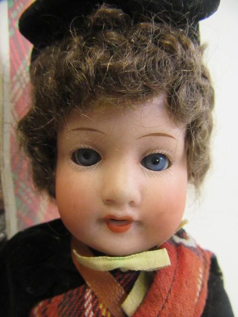 Three Scottish Armand Marseille bisque socket head dolls Image