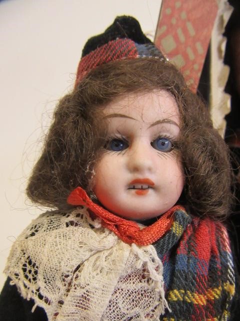 Three Scottish Armand Marseille bisque socket head dolls Image