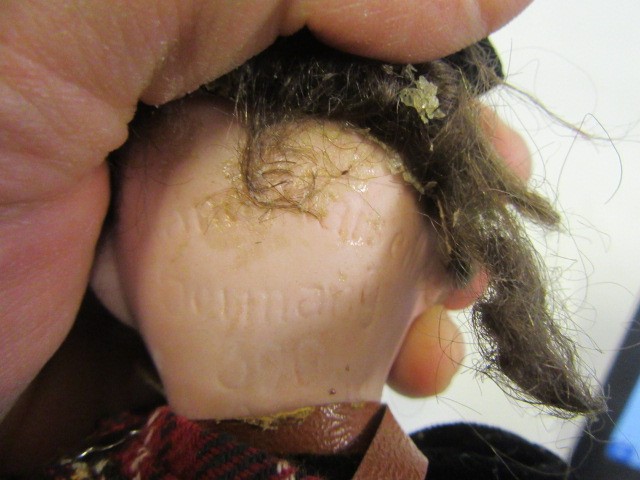 Three Scottish Armand Marseille bisque socket head dolls Image