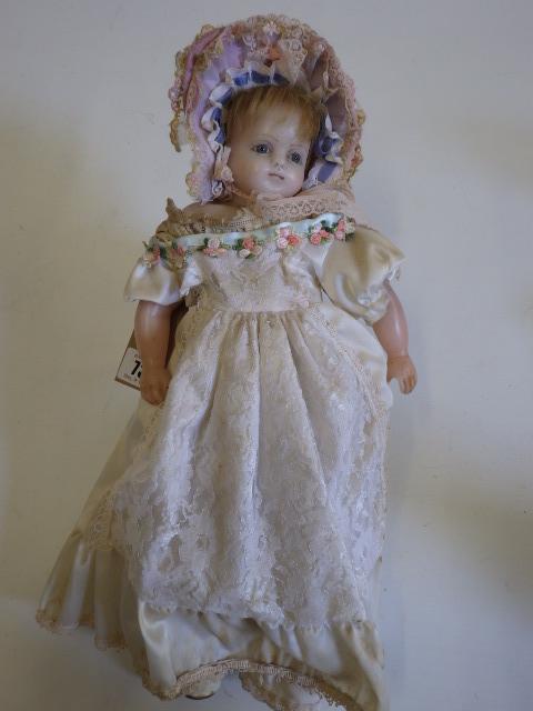A wax shoulder head doll Image