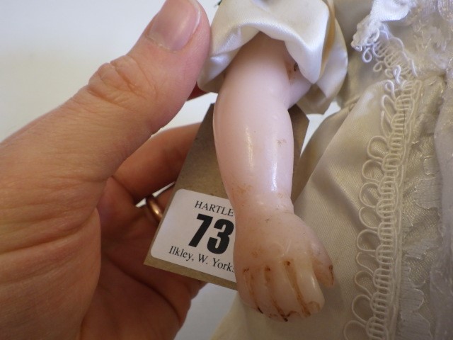 A wax shoulder head doll Image