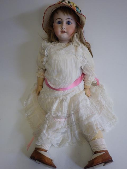 A Gebruder Kuhnlenz bisque socket head doll Image