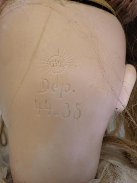 A Gebruder Kuhnlenz bisque socket head doll Image