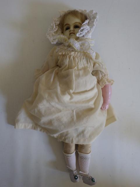 A wax shoulder head doll Image