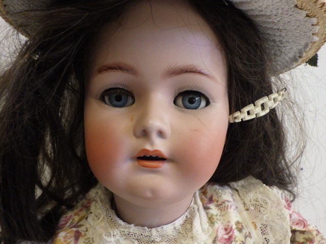 A Simon & Halbig for Heinrich Handwerck bisque socket head doll Image