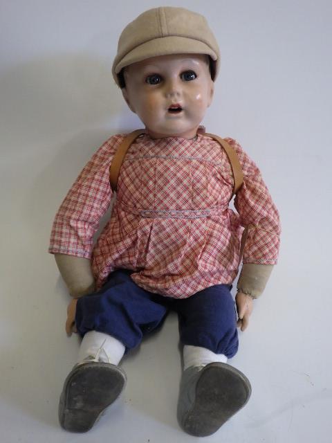 An SFBJ composition head boy doll Image
