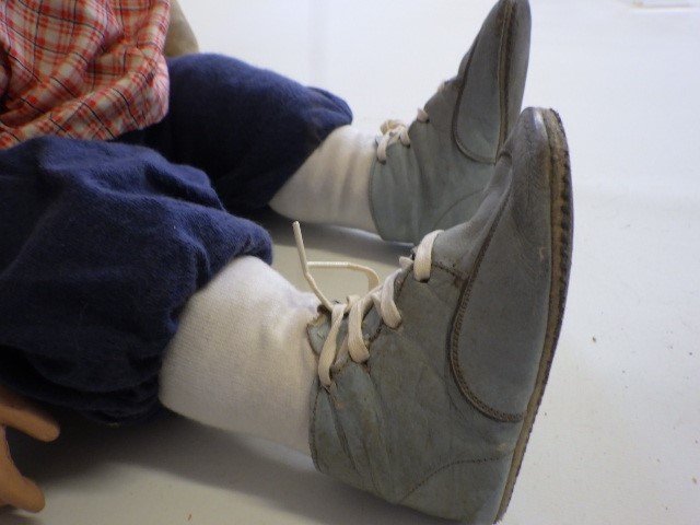 An SFBJ composition head boy doll Image