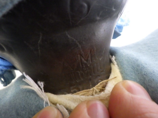 An Armand Marseille bisque socket head black baby doll Image