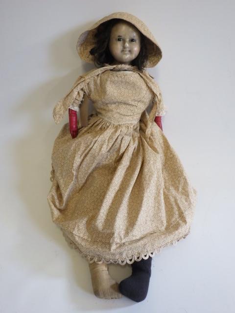 A 19th century wax shoulder head doll Image