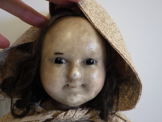 A 19th century wax shoulder head doll Image
