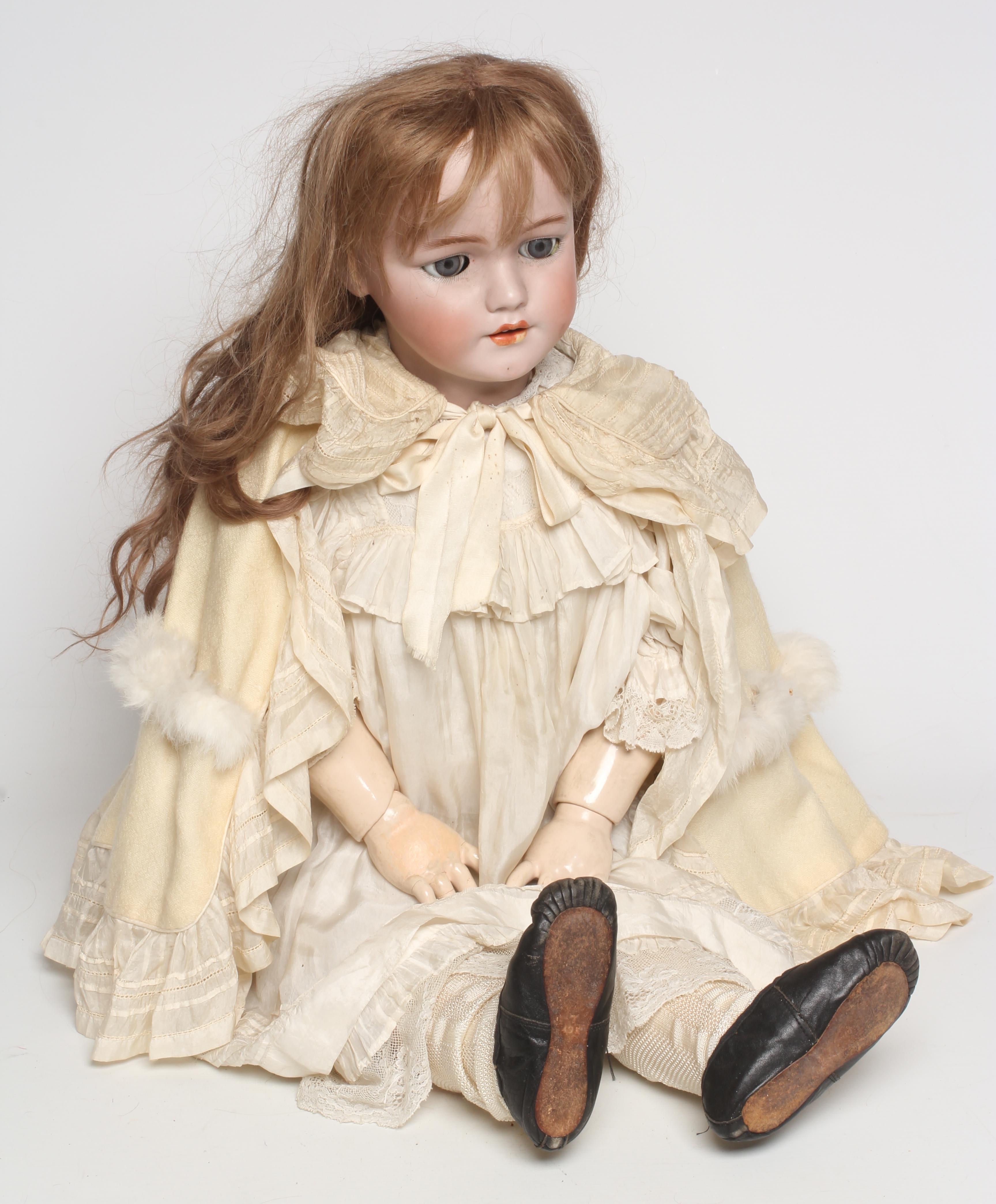 A large Simon & Halbig bisque socket head doll Image