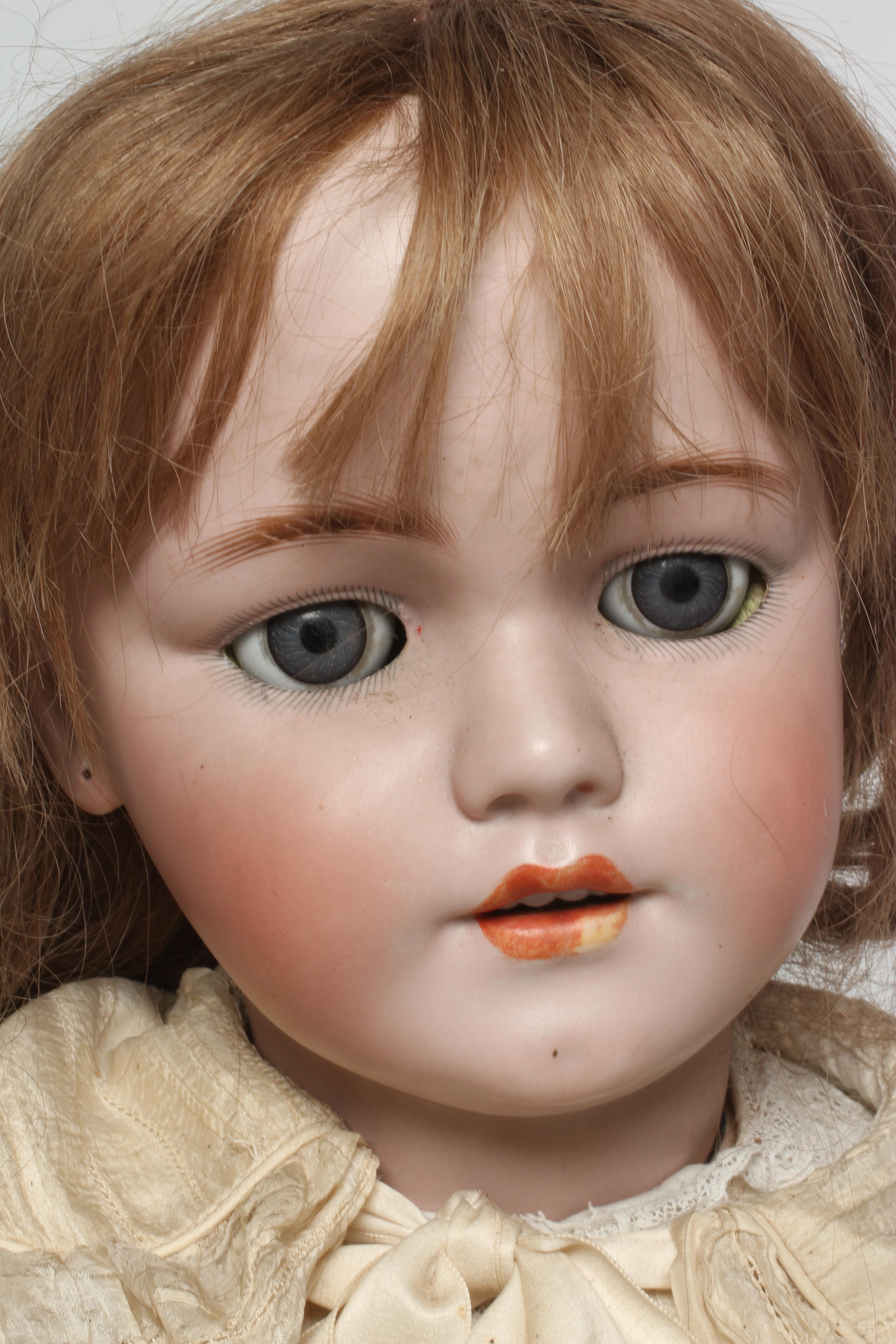 A large Simon & Halbig bisque socket head doll Image