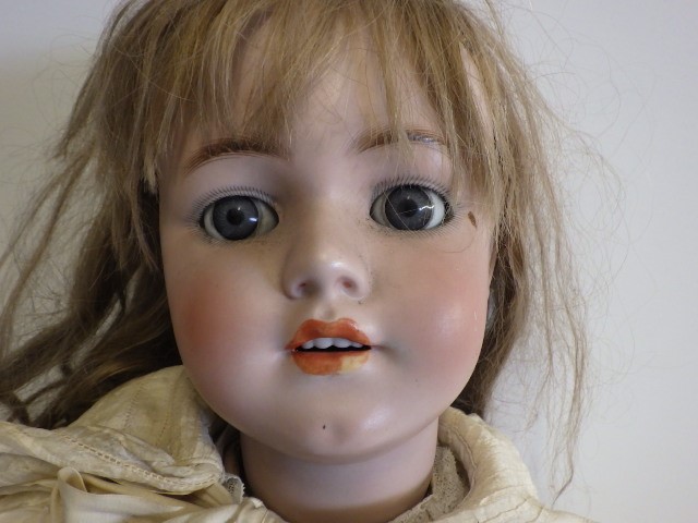 A large Simon & Halbig bisque socket head doll Image