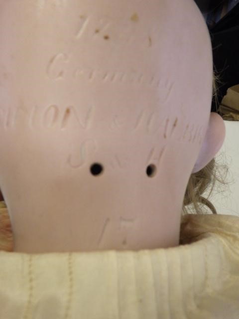 A large Simon & Halbig bisque socket head doll Image