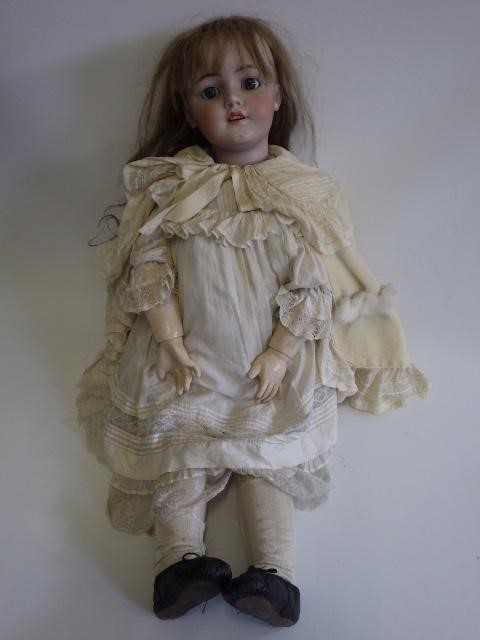A large Simon & Halbig bisque socket head doll Image