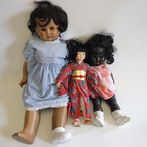 A composition socket head flirty doll Image