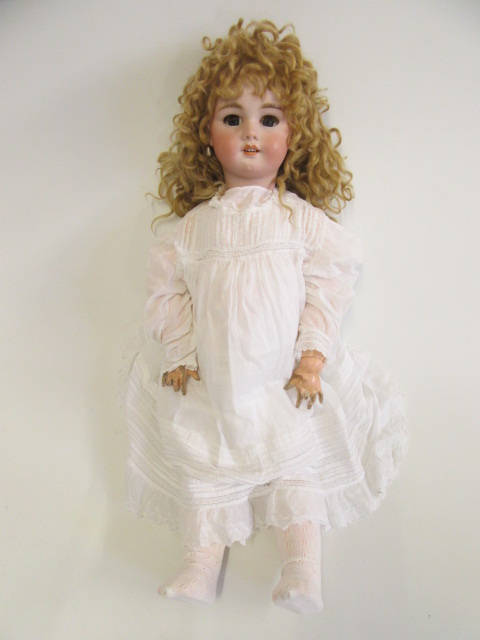 A bisque socket head doll Image