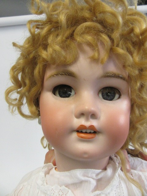 A bisque socket head doll Image